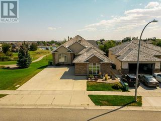 Photo 1: 1043 Canyon Boulevard W in Lethbridge: House for sale : MLS®# A2106179