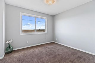 Photo 16: 86 New Brighton Point SE in Calgary: New Brighton Row/Townhouse for sale : MLS®# A1203534