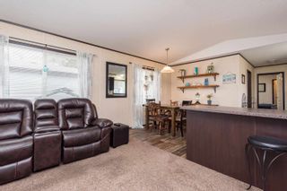 Photo 6: 25 3942 COLUMBIA VALLEY Road in Chilliwack: Cultus Lake Manufactured Home for sale in "Cultus Lake Village" : MLS®# R2680669