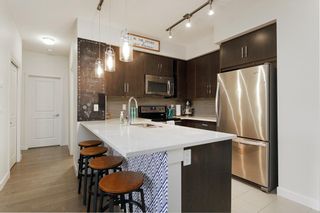 Photo 9: 211 25 Auburn Meadows Avenue SE in Calgary: Auburn Bay Apartment for sale : MLS®# A1214157
