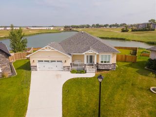 Photo 1: 323 TROON Cove in Niverville: The Highlands Residential for sale (R07)  : MLS®# 202330094
