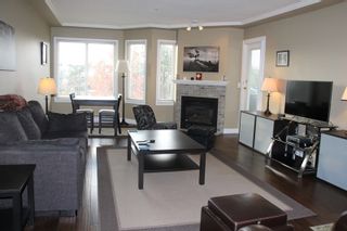 Photo 2: 404 20453 53 AVENUE in Langley: Langley City Condo for sale : MLS®# R2120225