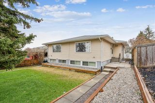 Photo 1: 919 32 Avenue NW in Calgary: Cambrian Heights 4 plex for sale : MLS®# A2129137