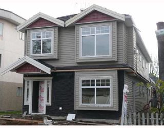 Photo 4: 450 E 44TH Avenue in Vancouver: Fraser VE 1/2 Duplex for sale (Vancouver East)  : MLS®# V681157