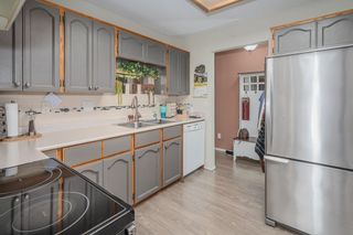 Photo 12: 304 33401 MAYFAIR Avenue in Abbotsford: Central Abbotsford Condo for sale in "MAYFAIR GARDENS" : MLS®# R2875255