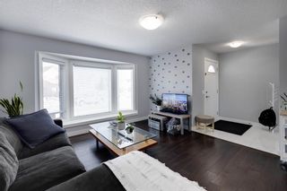Photo 4: 15 Woodmont Green SW in Calgary: Woodbine Detached for sale : MLS®# A1189304