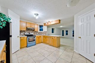 Photo 12: BRIDLEWOOD PL SW in Calgary: Bridlewood House for sale