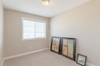 Photo 19: 60 Rockyspring Grove NW in Calgary: Rocky Ridge Semi Detached for sale : MLS®# A1203755