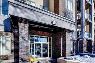 Photo 1: 408 910 18 Avenue SW in Calgary: Lower Mount Royal Apartment for sale : MLS®# A1039437