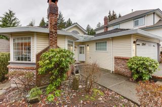 Photo 1: 11 BOULDERWOOD Place in Port Moody: Heritage Mountain House for sale : MLS®# R2746858
