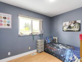 Photo 12: 1446 MCDONALD Place in Port Coquitlam: Lower Mary Hill House for sale : MLS®# R2187776