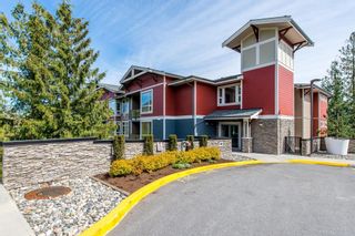 Photo 1: 204 2238 WHATCOM Road in Abbotsford: Abbotsford East Condo for sale in "Waterleaf" : MLS®# R2879188