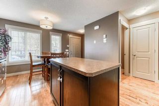 Photo 10: 257 RAINBOW FALLS Manor: Chestermere Row/Townhouse for sale : MLS®# A2128933
