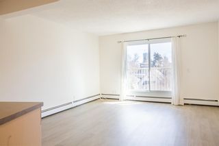 Photo 3: 407 222 5 Avenue NE in Calgary: Crescent Heights Apartment for sale : MLS®# A2042348