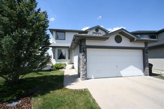 Photo 2: 218 ARBOUR RIDGE Park NW in Calgary: Arbour Lake House for sale : MLS®# C4186879