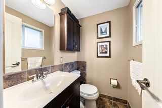 Photo 15: 216 Woodpark Place SW in Calgary: Woodlands Detached for sale : MLS®# A1208942