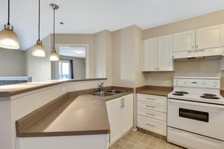 Photo 5: 1408 12 Cimarron Common: Okotoks Apartment for sale : MLS®# A1232805