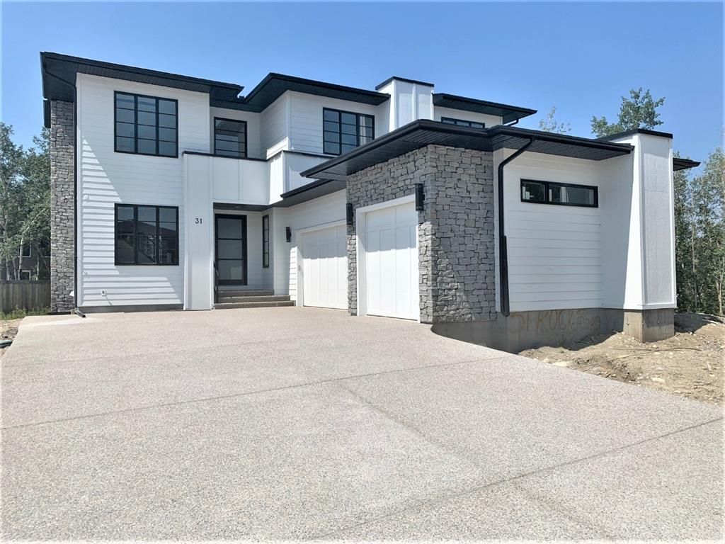 Main Photo: 31 Rockford Park NW in Calgary: Rocky Ridge Detached for sale : MLS®# A1151305