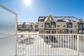 Photo 18: 806 32 Red Embers Parade NE in Calgary: Redstone Row/Townhouse for sale : MLS®# A2032219
