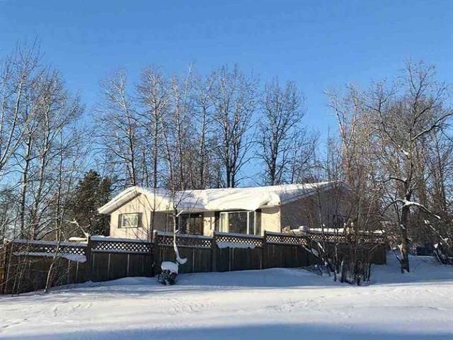 Photo 1: Photos: 5519 51 Street in Fort Nelson: Fort Nelson -Town House for sale in "HILL" (Fort Nelson (Zone 64))  : MLS®# R2634638