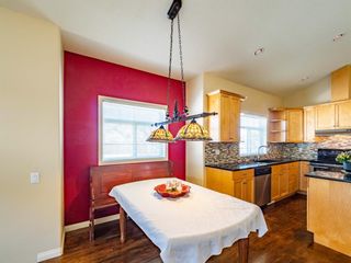 Photo 11: 7110 Elkton Drive SW in Calgary: Springbank Hill Detached for sale : MLS®# A1081310