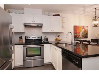 Photo 2: 211 738 E 29TH Avenue in Vancouver: Fraser VE Condo for sale (Vancouver East)  : MLS®# V1043108