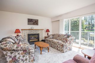 Photo 2: 955 REGAN Avenue in Coquitlam: Central Coquitlam House for sale : MLS®# R2780078
