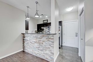 Photo 2: 1309 604 East Lake Boulevard NE: Airdrie Apartment for sale : MLS®# A2058113