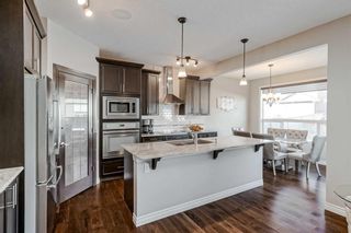 Photo 6: 168 Cougar Ridge Manor SW in Calgary: Cougar Ridge Detached for sale : MLS®# A2123465