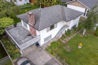 Photo 2: 857 SHAW Avenue in Coquitlam: Coquitlam West House for sale : MLS®# R2710949