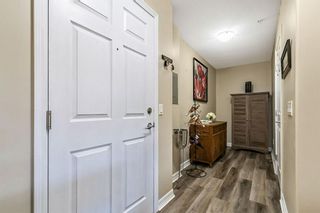 Photo 2: 3303 92 Crystal Shores Road: Okotoks Apartment for sale : MLS®# A1245772