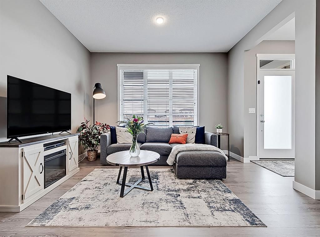 Main Photo: 406 Belmont Avenue SW in Calgary: Belmont Row/Townhouse for sale : MLS®# A1217248