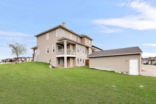 Photo 29: 280 Rainbow Falls Green: Chestermere Semi Detached for sale : MLS®# A1016223