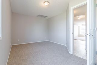 Photo 10: 407 140 Sagewood Boulevard SW: Airdrie Row/Townhouse for sale : MLS®# A1226204