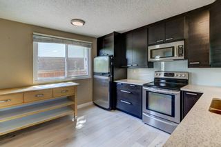 Photo 7: 60 5625 Silverdale Drive NW in Calgary: Silver Springs Row/Townhouse for sale : MLS®# A2050295