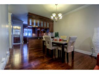 Photo 4: 125 3333 DEWDNEY TRUNK Road in Port Moody: Port Moody Centre Townhouse for sale : MLS®# V1037000