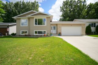 Photo 1: 42 Cadham Bay in Portage la Prairie: House for sale : MLS®# 202318333