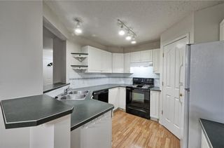 Photo 3: 1346 SOMERSIDE Drive SW in Calgary: Somerset House for sale : MLS®# C4171592