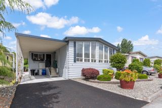 Photo 1: 4 1640 162 Street in Surrey: King George Corridor Manufactured Home for sale in "Cherry Brook Park" (South Surrey White Rock)  : MLS®# R2706100
