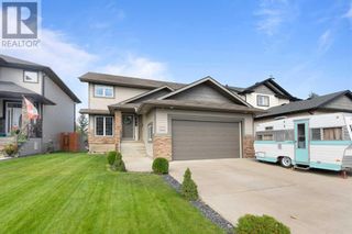 Photo 1: 303 Hamptons Way SE in Medicine Hat: House for sale : MLS®# A2076691