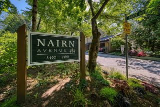 Photo 1: 3452 NAIRN Avenue in Vancouver: Champlain Heights Townhouse for sale in "COUNTRY LANE" (Vancouver East)  : MLS®# R2782729