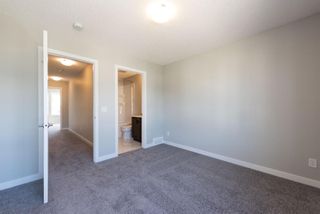 Photo 26: 123 301 REDSTONE Boulevard in Calgary: Redstone Row/Townhouse for sale : MLS®# A1246264