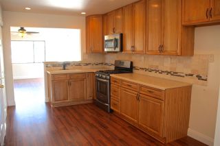 Photo 3: SERRA MESA House for sale : 3 bedrooms : 8454 Macawa in san diego