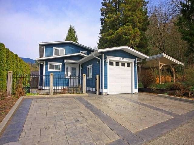 Main Photo: 1903 LODGE Drive in Coquitlam: River Springs House for sale in "RIVER SPRINGS" : MLS®# V1053767