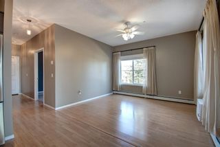 Photo 9: 110 305 1 Avenue NW: Airdrie Apartment for sale : MLS®# A1255700