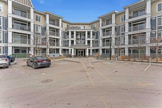 Photo 1: 211 130 Auburn Meadows View SE in Calgary: Auburn Bay Apartment for sale : MLS®# A2115919