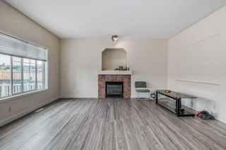 Photo 6: 129 Simcoe Circle SW in Calgary: Signal Hill Detached for sale : MLS®# A2074771