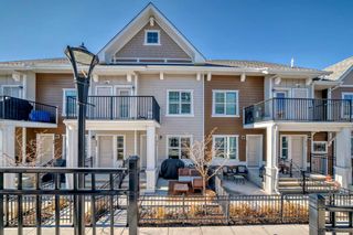 Photo 1: 811 Cranbrook Walk SE in Calgary: Cranston Row/Townhouse for sale : MLS®# A2115536