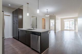 Photo 4: 212 28 Auburn Bay Link SE in Calgary: Auburn Bay Apartment for sale : MLS®# A1250132