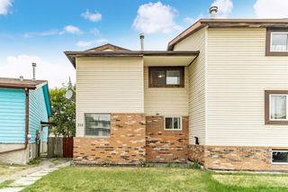 Photo 1: 215 Aboyne Place NE in Calgary: Abbeydale Semi Detached for sale : MLS®# A1245769